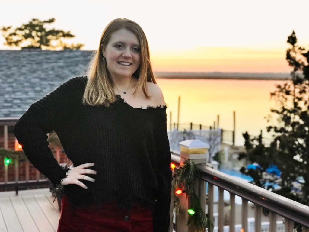 White woman with blond hair smiling