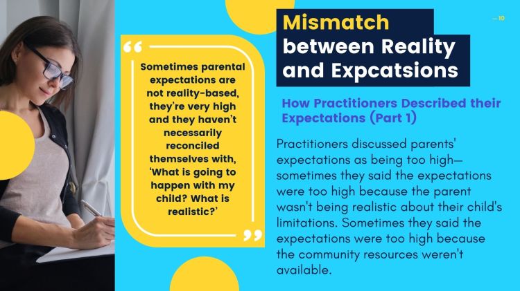 A young woman wearing glasses, and black jacket an drack grey shirt. The woman is writing in a notebook using a pen.